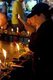 Thailand: Devotees with candles at the Inthakin or Lak Mueang Festival, Wat Chedi Luang, Chiang Mai